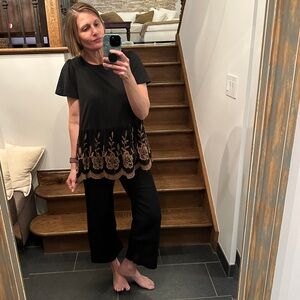 Altar’d State Women’s t-shirt with an Floral Embroidered Black and Gold bottom